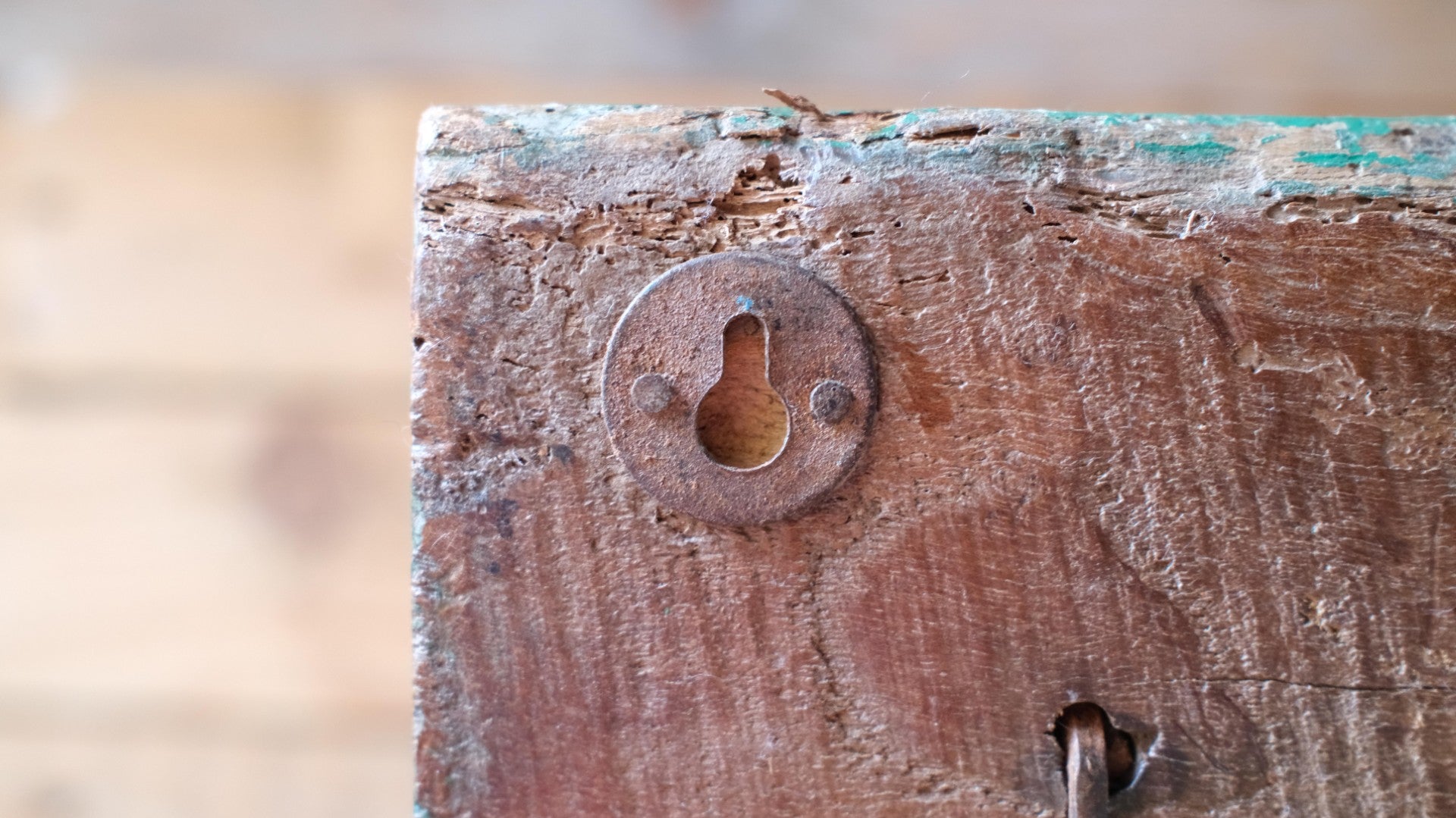 Close-up of a wooden lock with a blurred background
