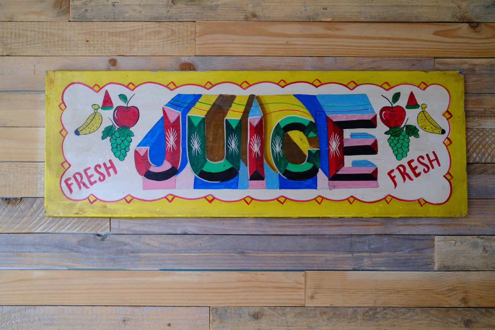 Colorful hand painted juice sign 