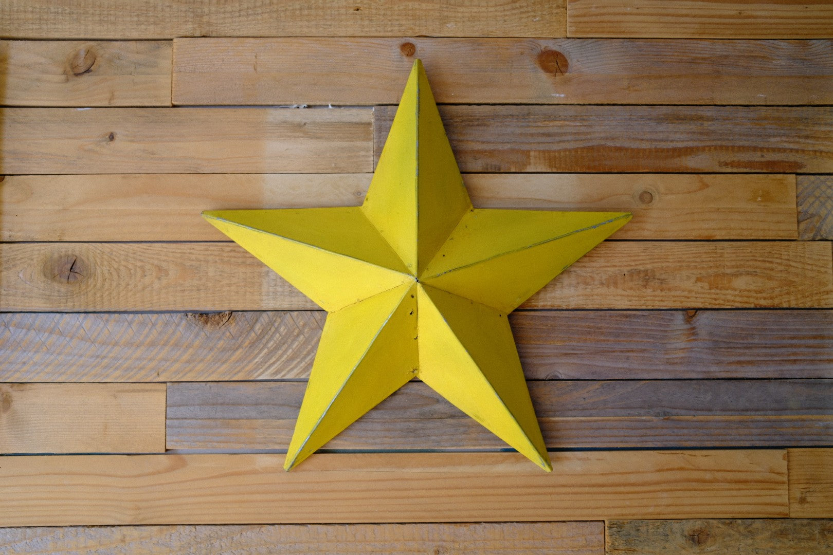 Bright Yellow Metal Barn Star