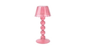 Pink table lamp tea light holder with a unique design on a white background