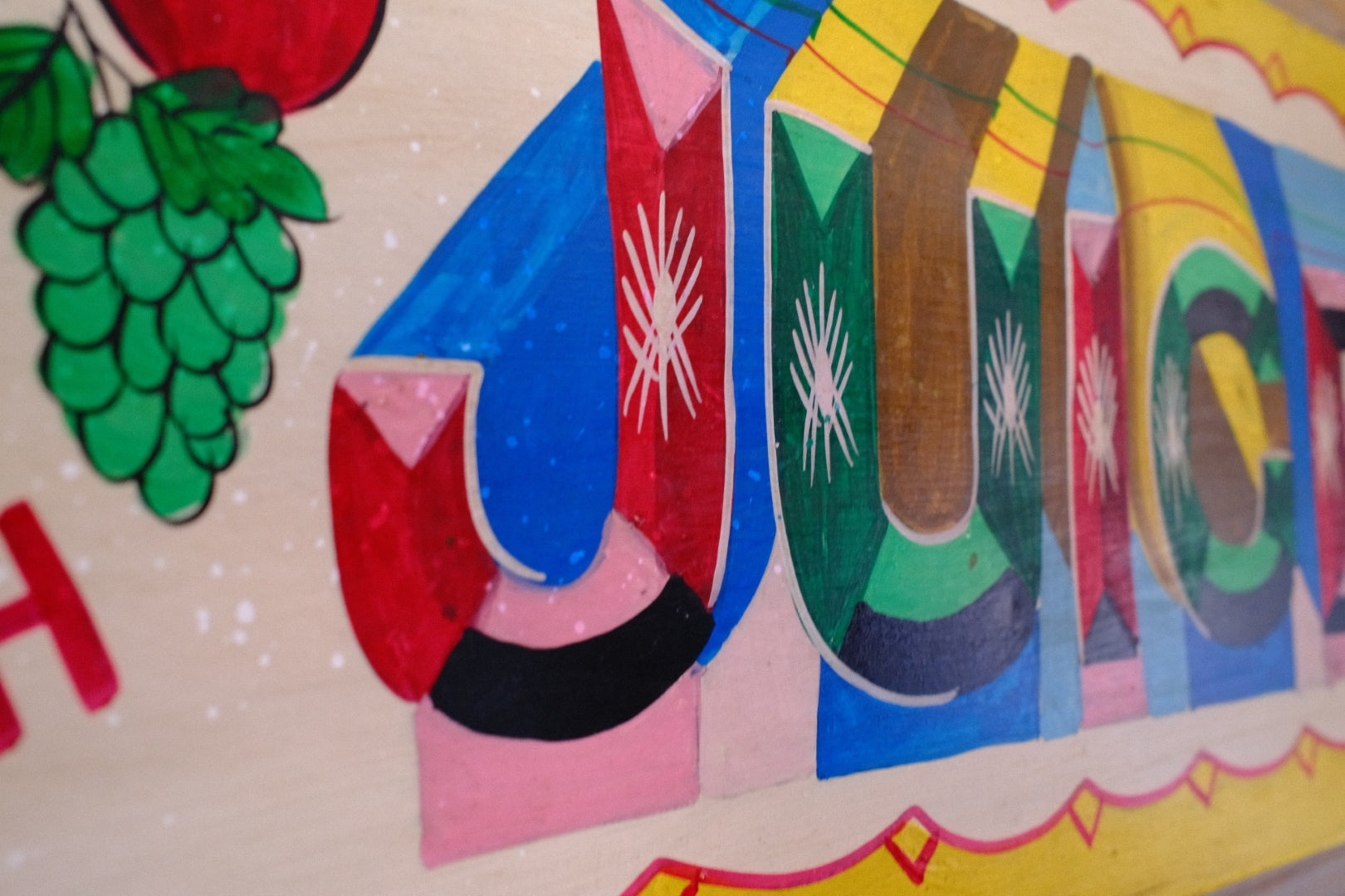 Colorful hand painted juice sign 