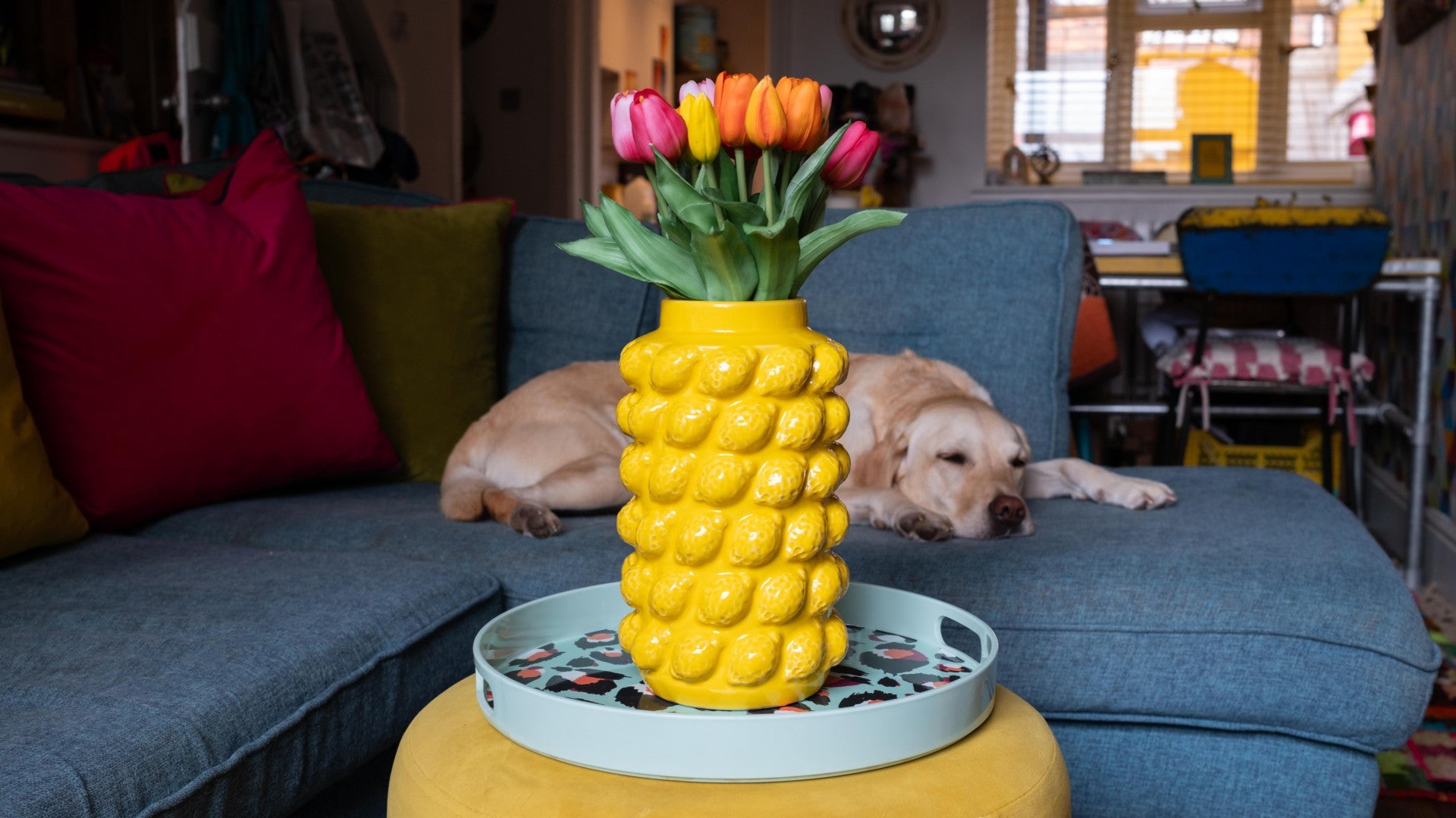 Lemon embossed vase on display in colourful dopamine decor home 