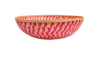 Pink zig-zag patterned bamboo basket handwoven with natural fibres
