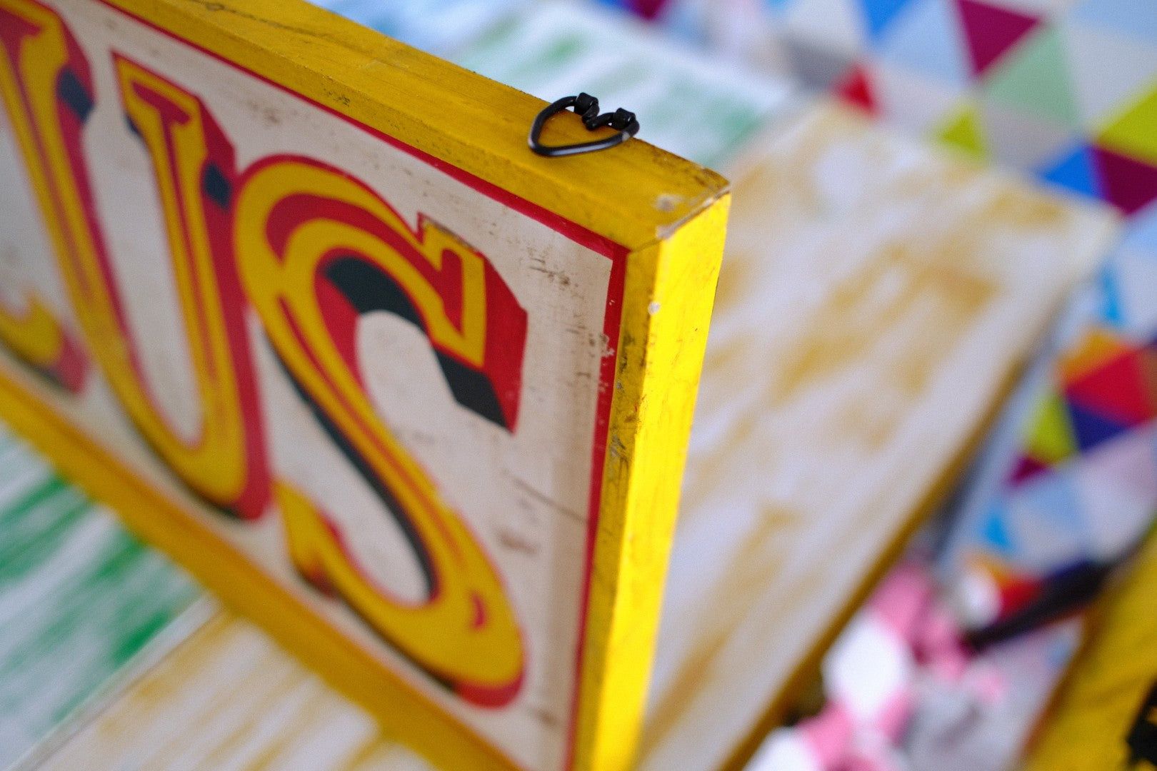Vintage style circus sign hanging detail 