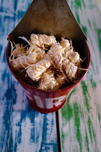 Red fire bucket filled with firelighters 