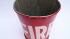 Close up of red vintage style fire bucket 