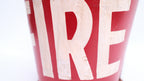 Red fire bucket with 'FIRE' text on a white background