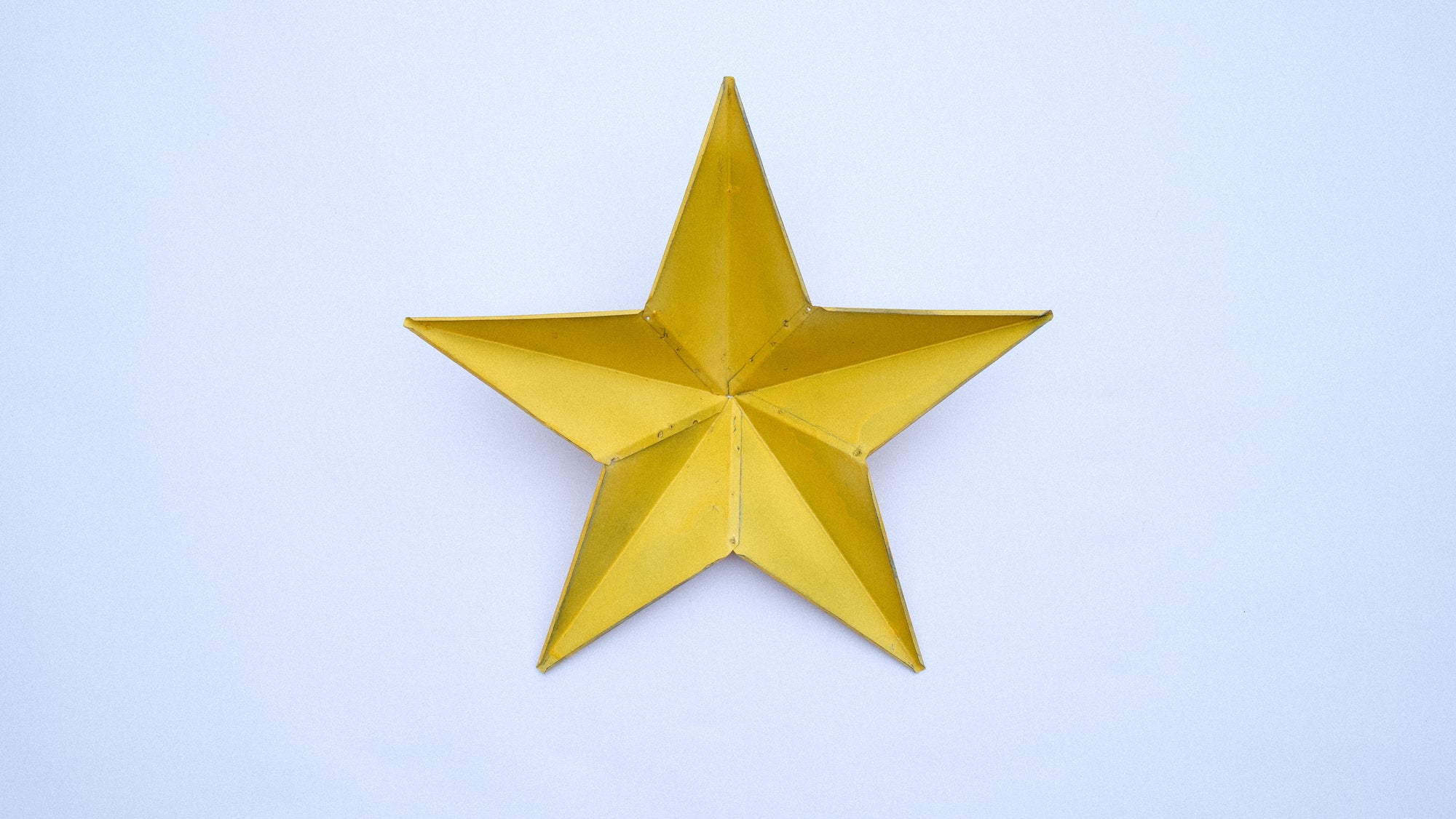 Bright Yellow Metal Barn Star