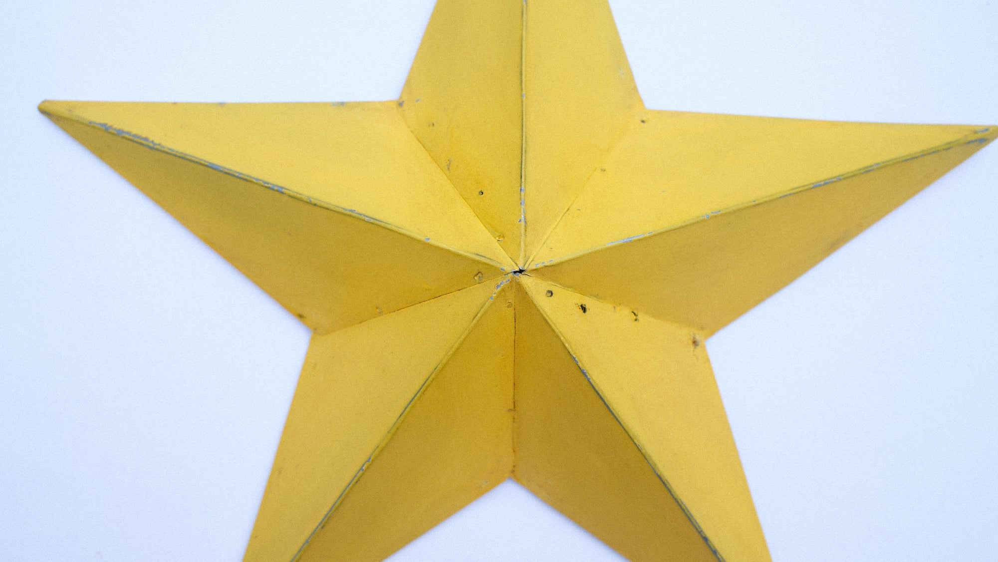 Bright Yellow Metal Barn Star