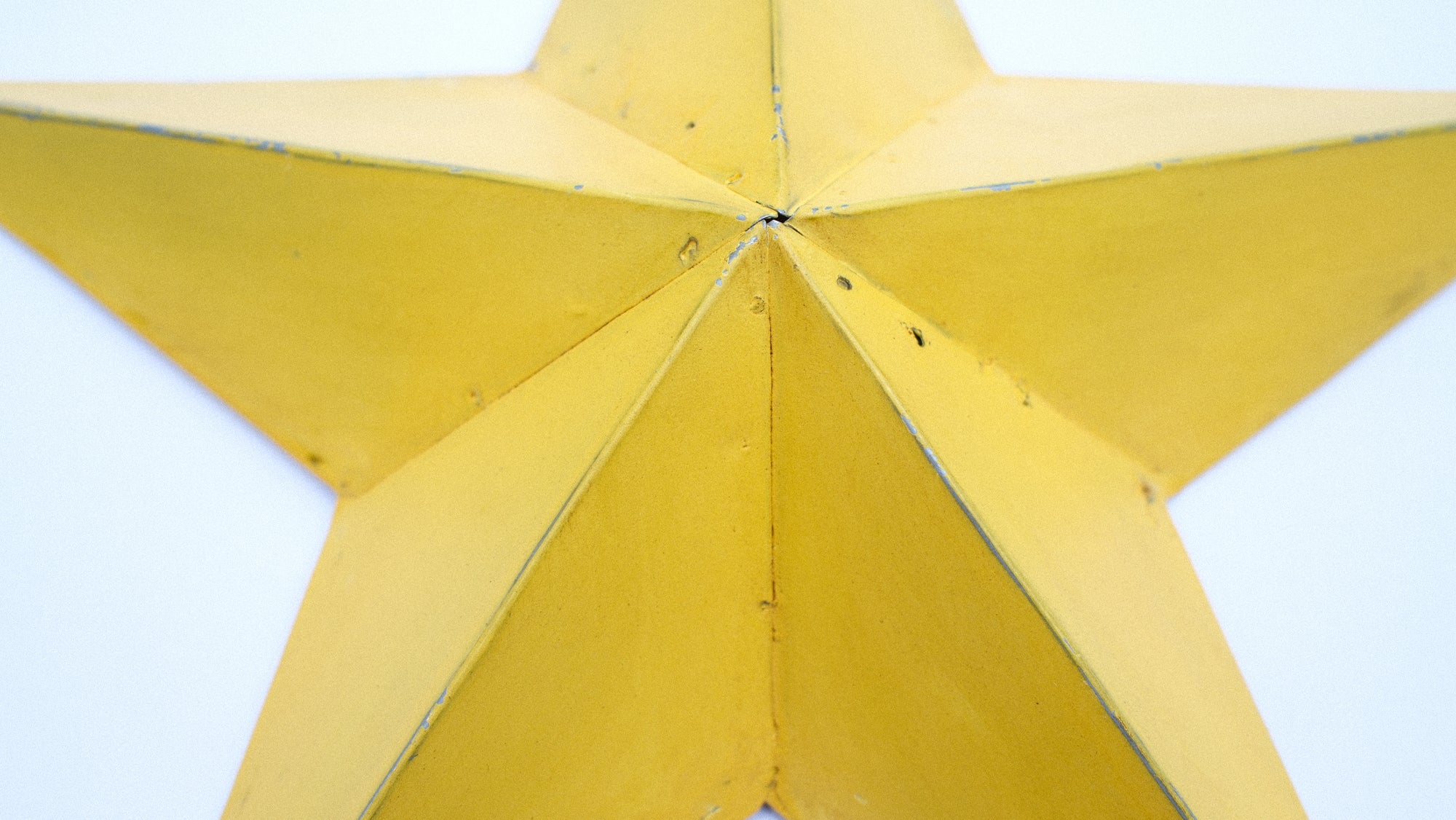 Bright Yellow Metal Barn Star