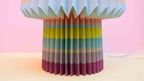 Colorful paper lamp with a pastel background