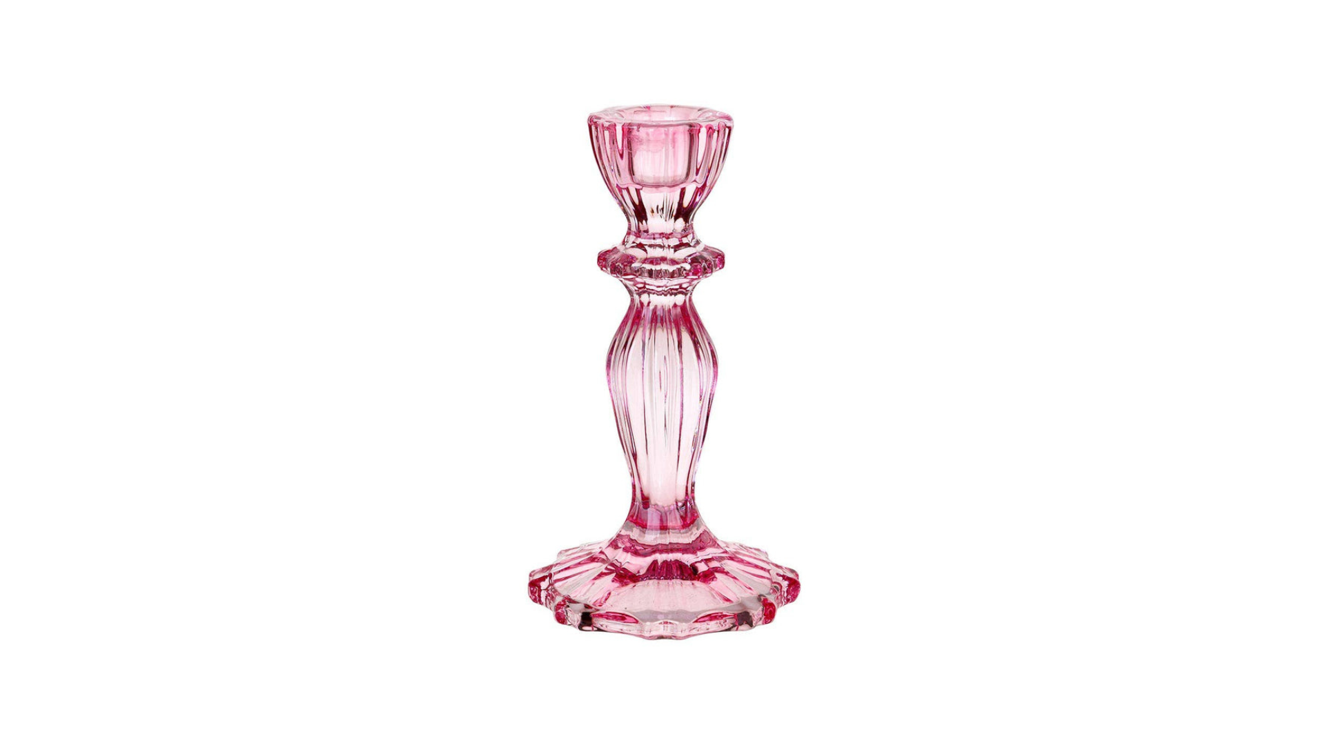 Pink glass candle holder on a white background