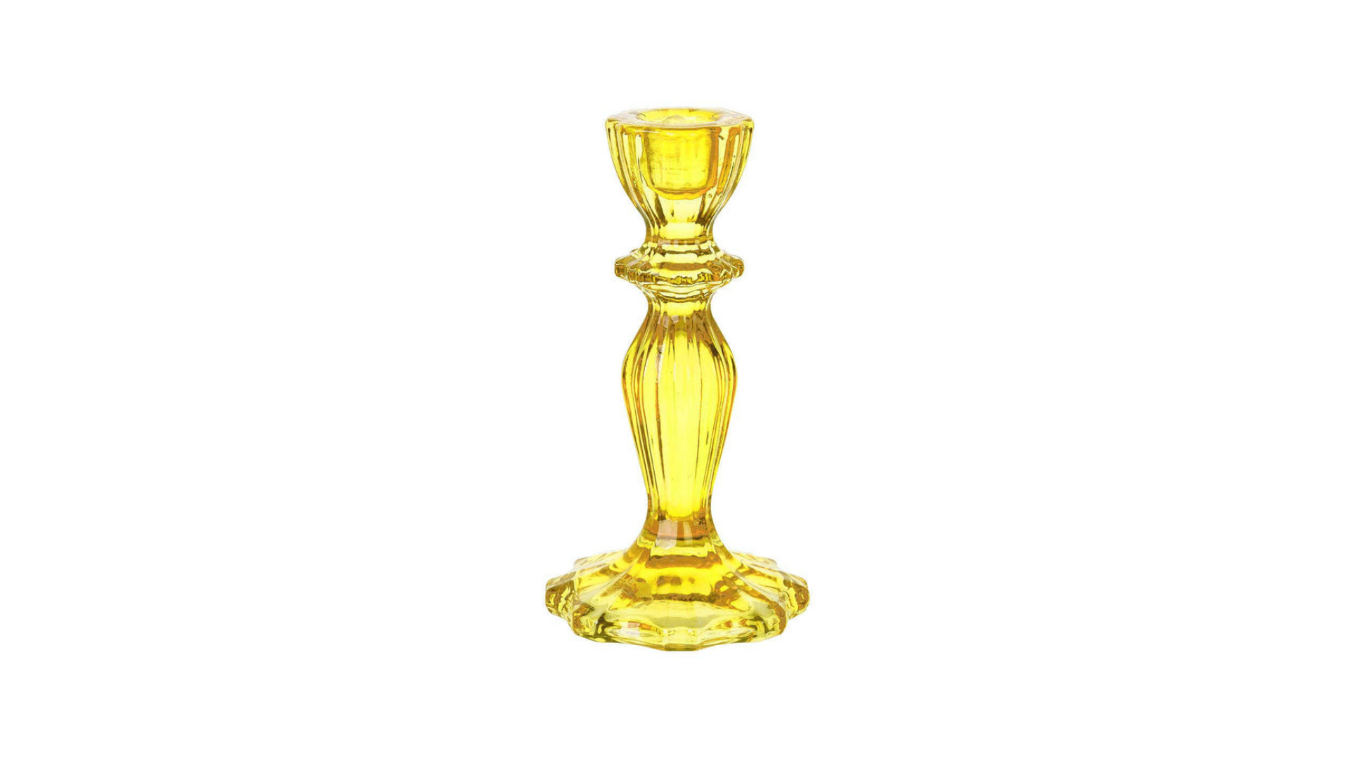 Yellow glass candle holder on a white background