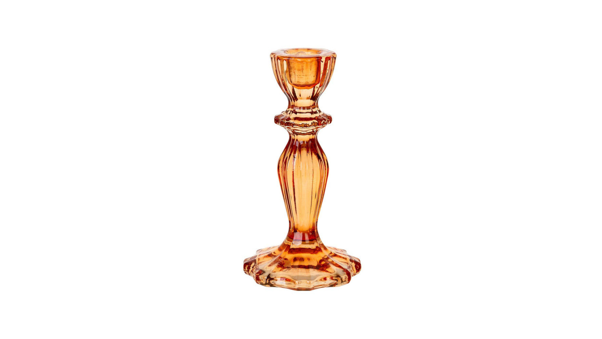 Amber glass candle holder on a white background