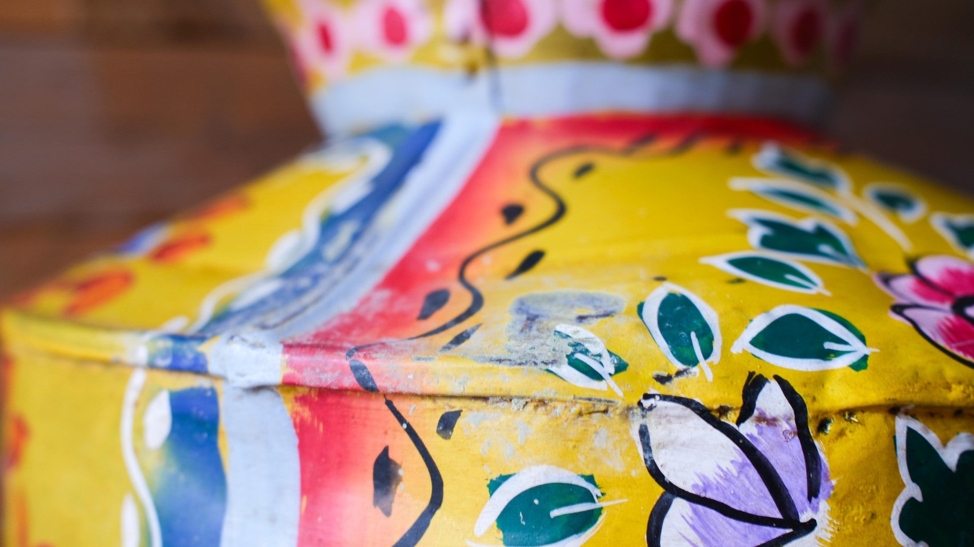 Colorful metal with floral patterns on a blurred background